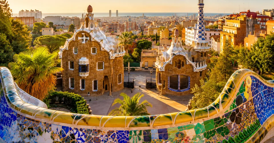 Park Güell's mosaic bench above the pavilions and the city
